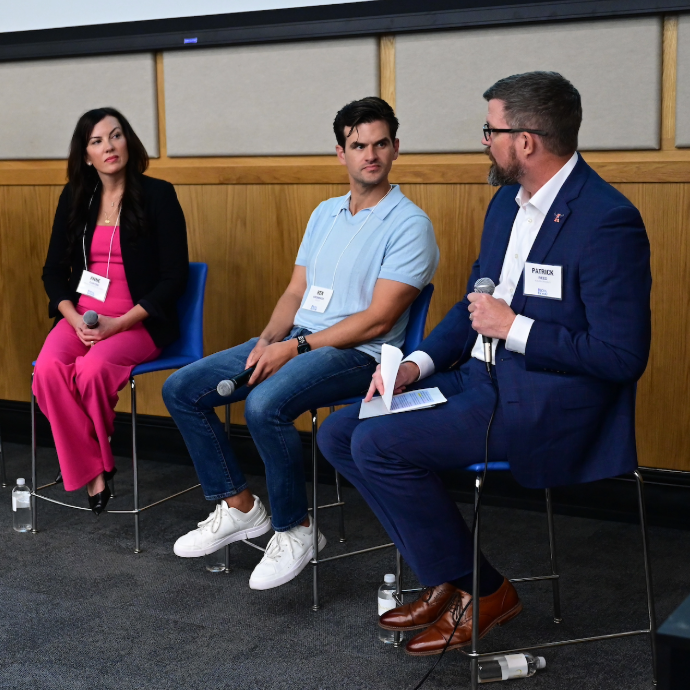 People sitting at a panel