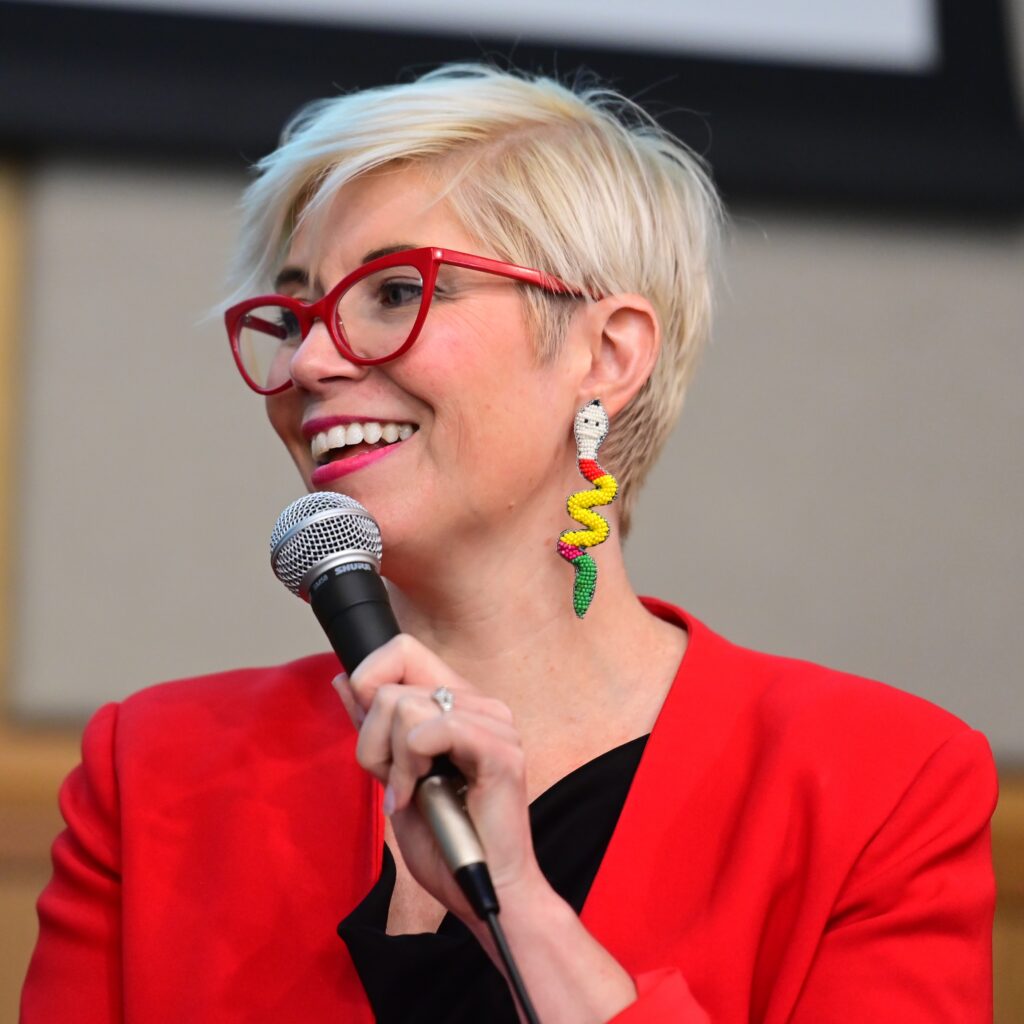 Elaine Hamm speaking into microphone