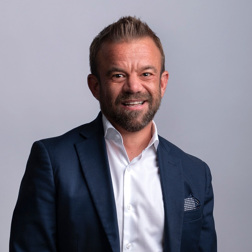 Mark Black headshot with blank background