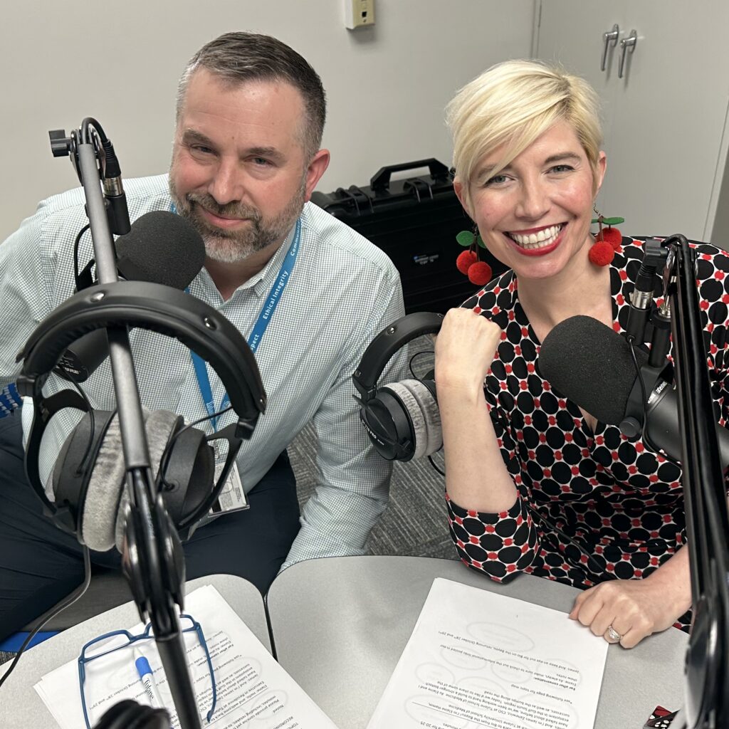 James Zanewicz and Elaine Hamm in front of microphones