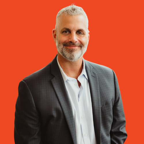 Christiaan Engstrom headshot on an orange background